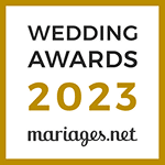 Badge officiel Wedding Awards 2023 de mariages.net. Prix d'excellence pour professionnels du mariage, fond blanc, bordure dorée.